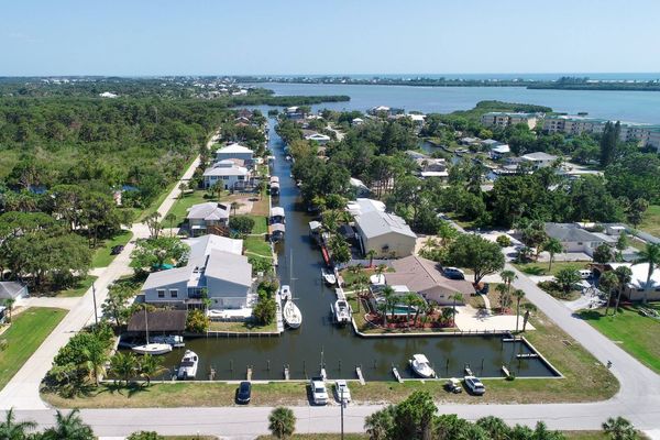 Aerial of corner house and down the canal leading to Lemon Bay