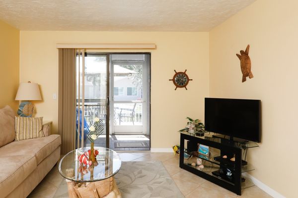 Comfortable living room space with 35x20 Smart TV with DirecTV