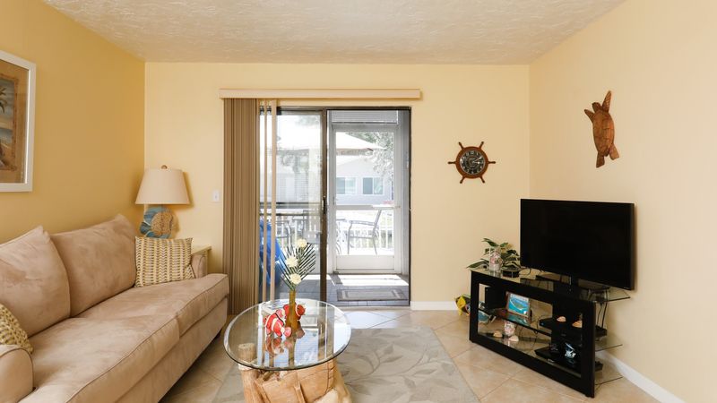 Comfortable living room space with 35x20 Smart TV with DirecTV