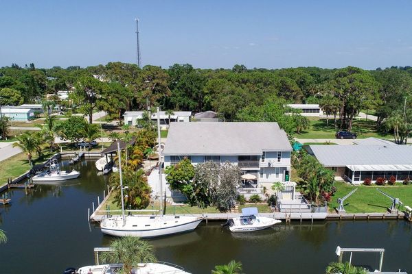 Aerial of corner canal house (Boat lift not available)