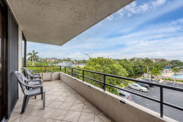 West-Facing Balcony overlooks the pool and Gulf just beyond.