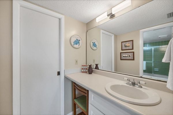 Primary En Suite with Shower Tub Combo and Double Vanities