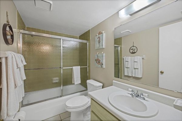 Primary En Suite with Shower Tub Combo and Double Vanities