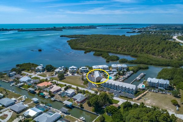 Aerial View overlooking the townhome in regard to the Gulf and Lemon Bay