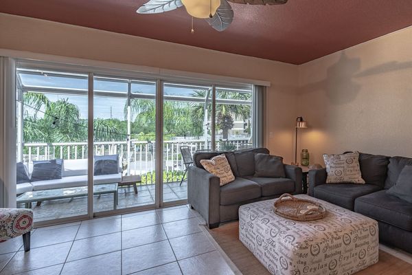 Living Room with private enclosed patio overlooking the docks