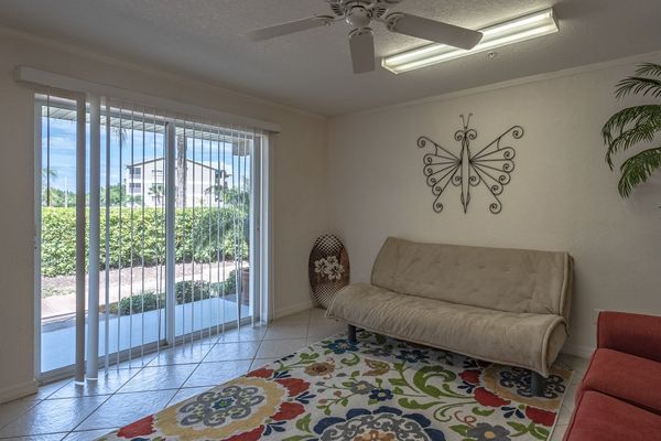 Downstairs Family room with patio access with walkout to the community spaces