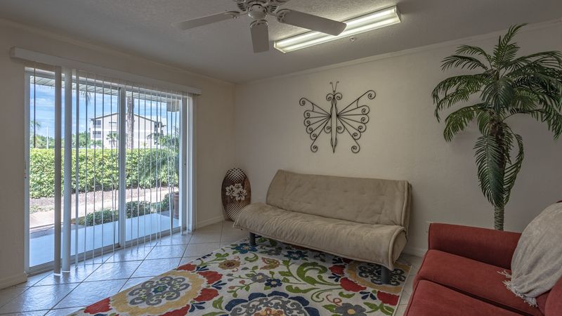 Downstairs Family room with patio access with walkout to the community spaces