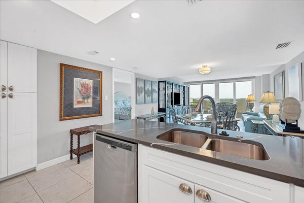 Beautifully updated, fully-equipped kitchen overlooking living room/dining room