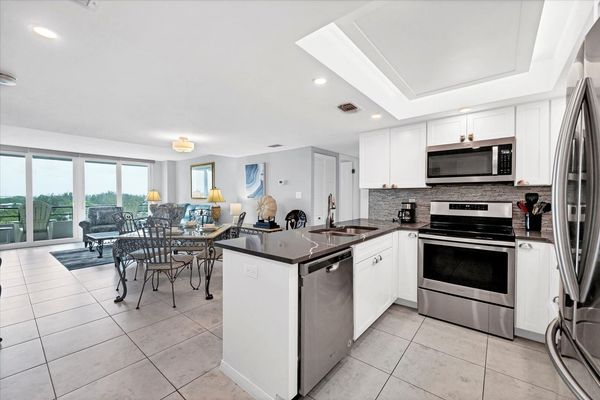 Beautifully updated, fully-equipped kitchen overlooking living room/dining room