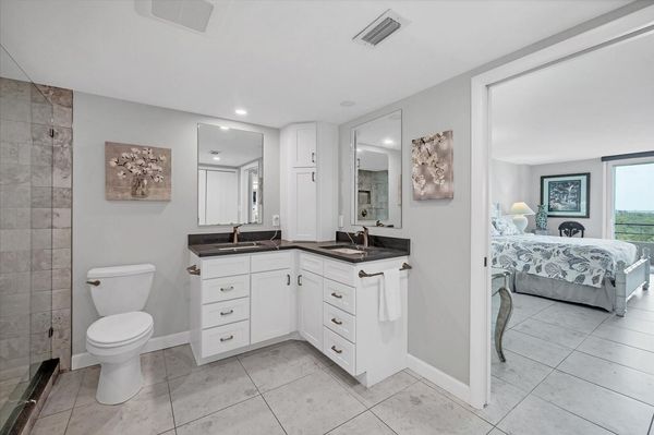 Primary en suite and large walk-shower and double vanities
