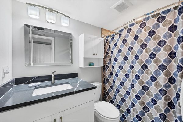 Guest bathroom with shower/tub combo