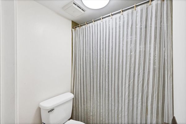 Primary bathroom with shower/tub combo