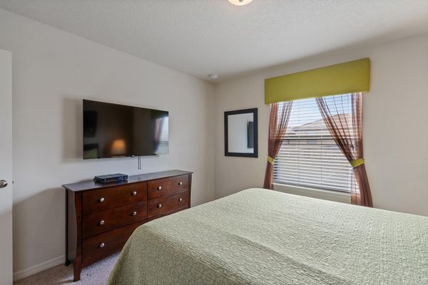 Queen Bedroom 4 (Angle) 50" Roku TV