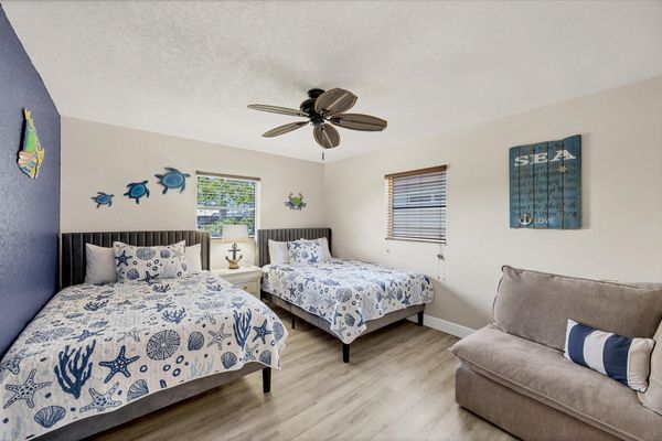 Guest bedroom 2 with two queen beds