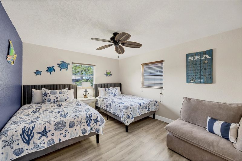 Guest bedroom 2 with two queen beds