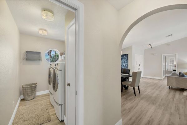Laundry room with full-size washer and dryer