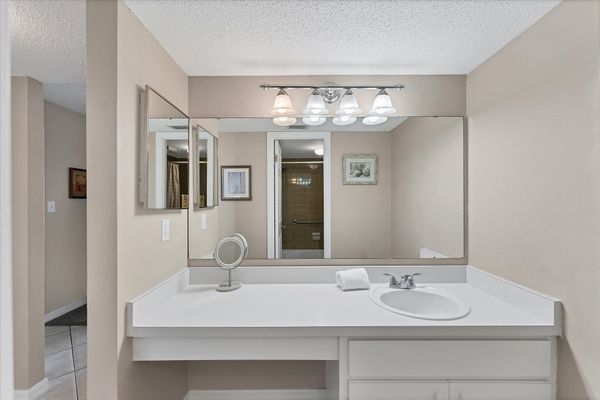 Primary attached bathroom with shower/tub combo
