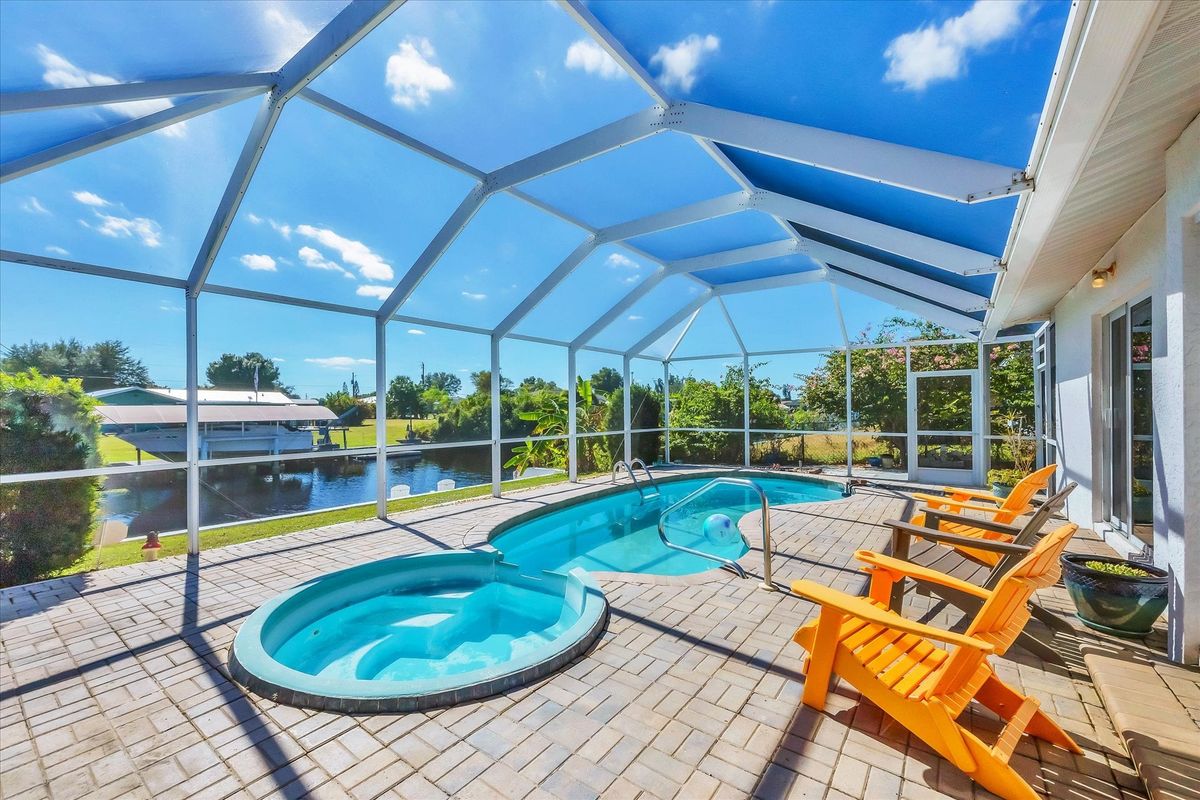 Pool & spa overlooking canal