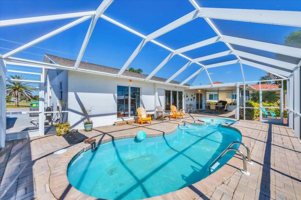 Pool & spa overlooking canal