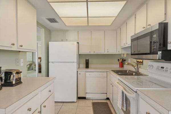 Fully-equipped kitchen with balcony access