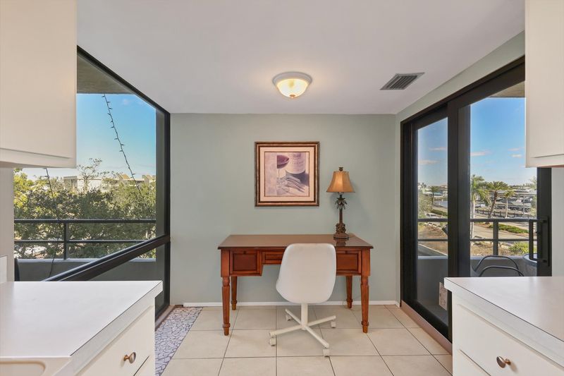 Fully-equipped kitchen with balcony access