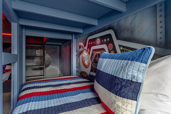 Each bunkbed is themed with one of their favorite characters