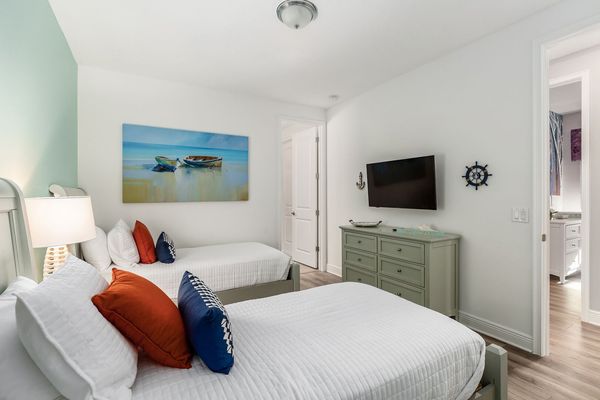 Featuring 2 twin-size beds and a TV