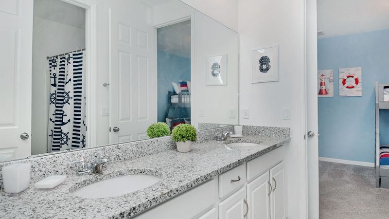 Jack N Jill Bathroom
Upstairs
Tub/Shower Combo