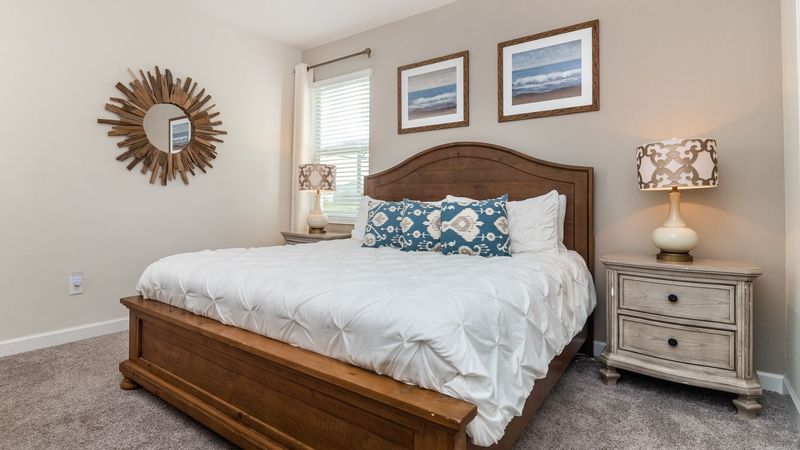 Master King Bedroom 1 Downstairs
Attached Bathroom
Pool Access