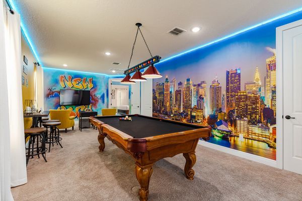 Play a round of pool with friends or family in the custom NY themed loft.