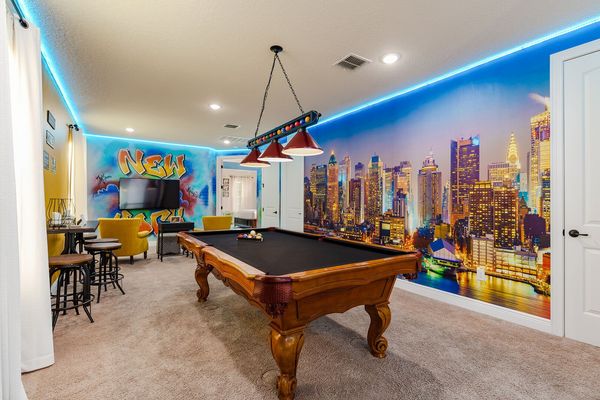 Play a round of pool with friends or family in the custom NY themed loft.