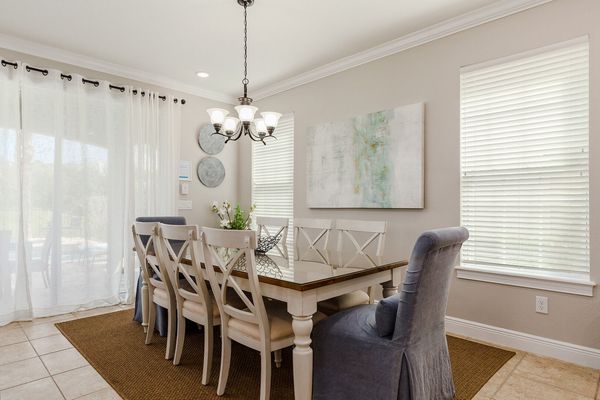 The dining table has seating for 8.