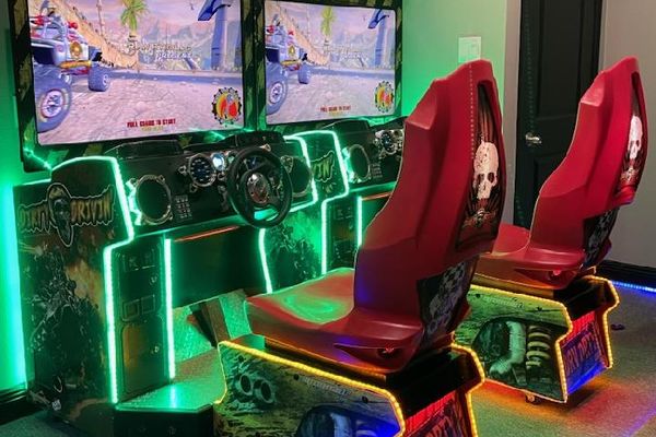 Challenge a family member to a race on the racing arcade machine