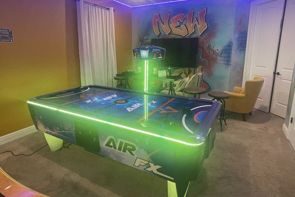 Air hockey table added March 2023.