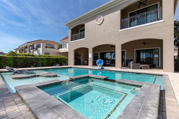 Lounge in the private pool with spillover spa