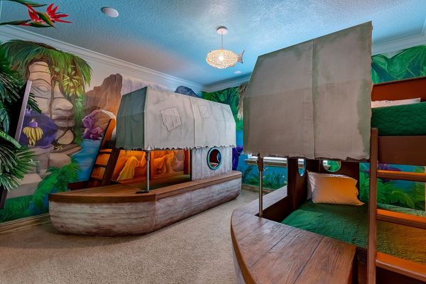 Kids will find adventures in the jungle cruise inspired bedroom