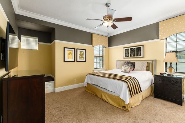 The master suite bedroom 5 is located on the second floor with a king bed and 55-inch SMART TV
