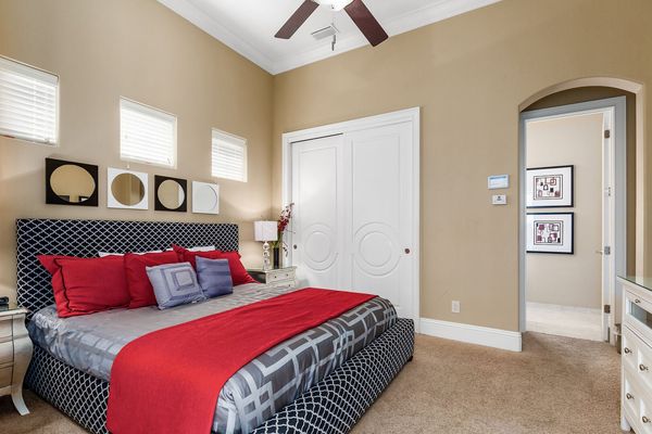 The second master suite on the ground floor has a king bed and ensuite bathroom