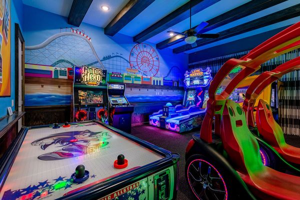 Verse family and friends in a game of air hockey