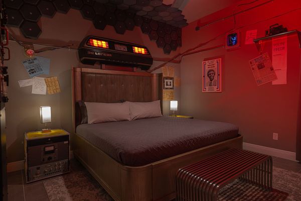 Travel "back in time" in this bedroom with fan-favorite futuristic gadgets, a king-size bed, a 55-inch 4k SMART TV, and an en-suite bathroom.