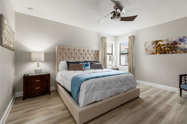 Second floor Master Suite furnished with a king-size bed