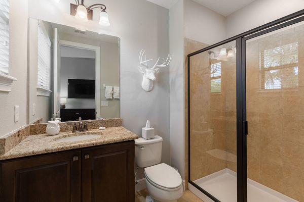 Attached bathroom with walk-in shower