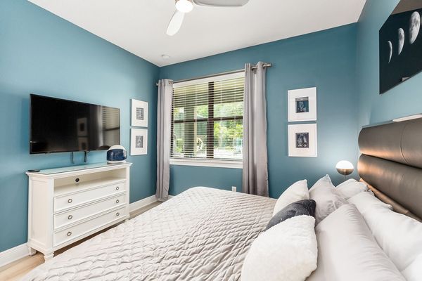 View the pool from the downstairs Master Suite