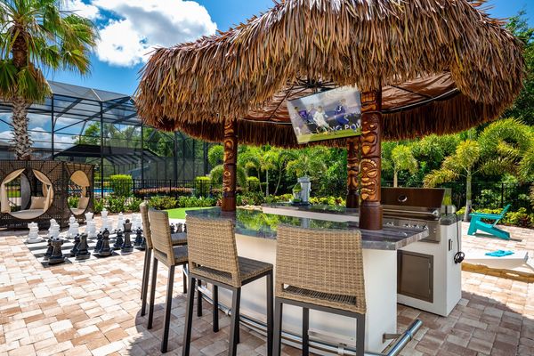 Sit at the tiki bar and enjoy a delicious meal