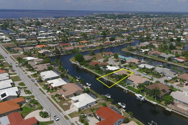 Aerial of house on canal (Boat lift not available)