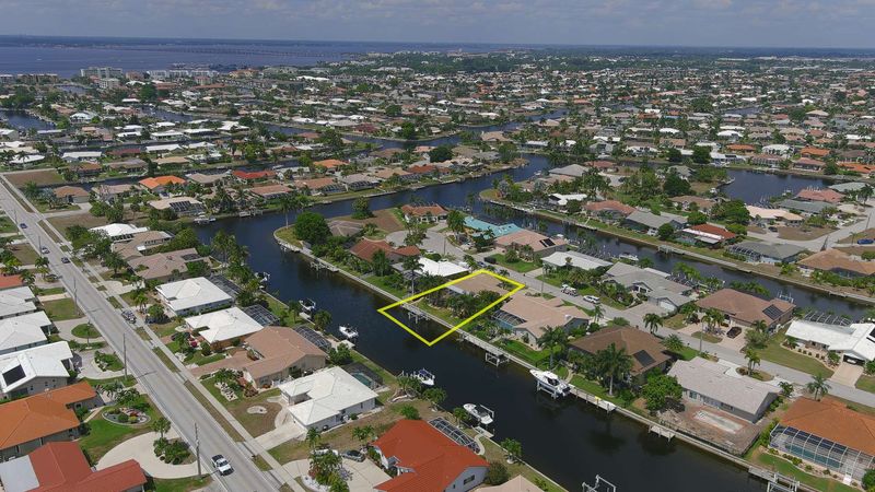 Aerial of house on canal (Boat lift not available)