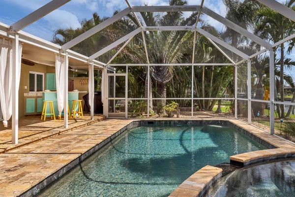 Pool and spa overlooking canal
