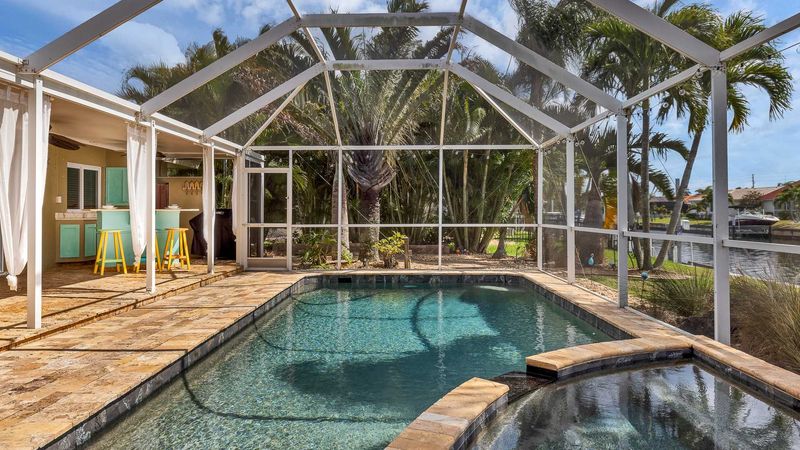 Pool and spa overlooking canal