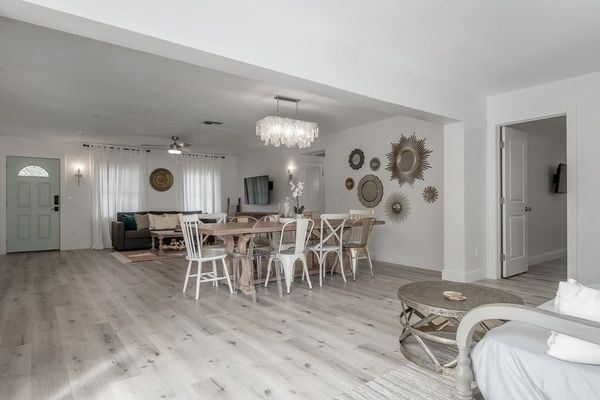 Large open concept Living, Dining, and Sunroom with Pool access