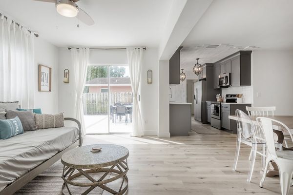 View of Sunroom, Kitchen, and Dining room